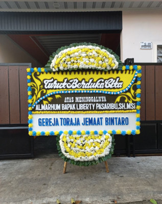 Papan Bunga Duka di Giriwoyo